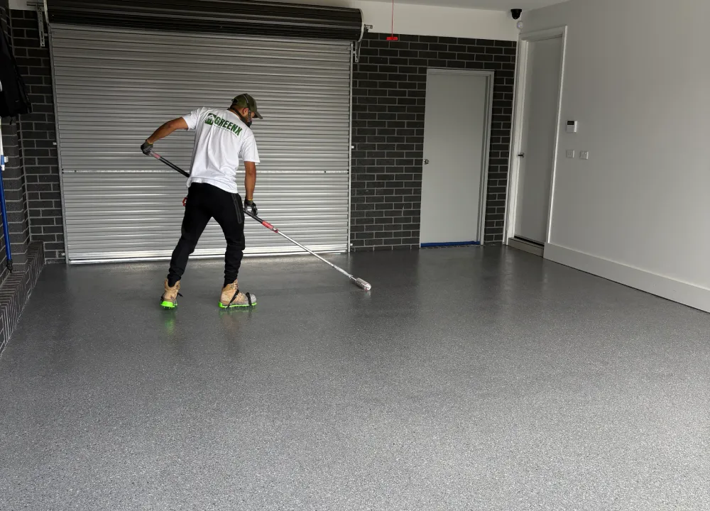 Flake epoxy flooring finish showing mottled, textured pattern.
