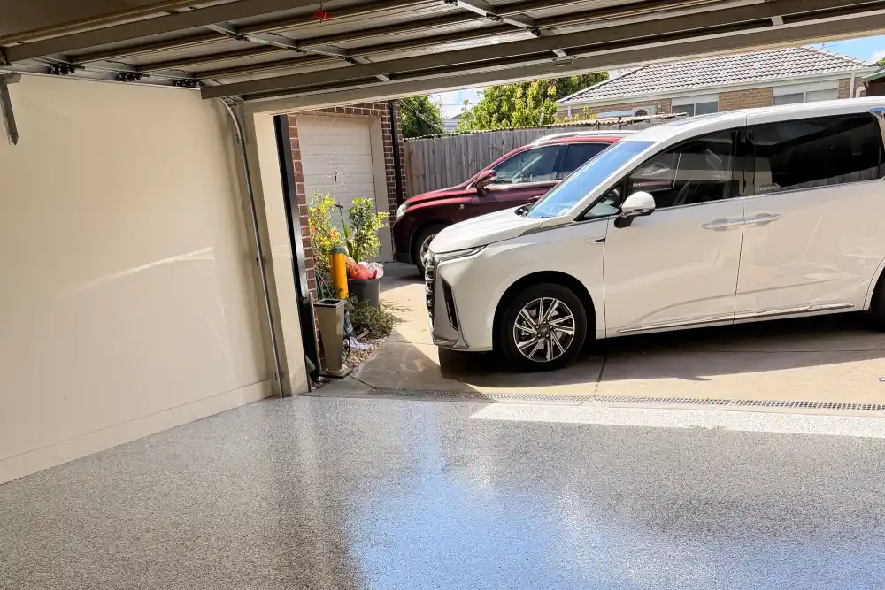 Residential epoxy flooring installation by Greenx Painting in Melbourne.