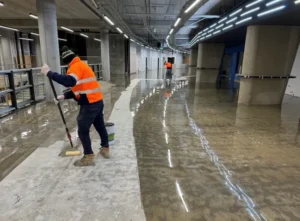 Metallic epoxy flooring finish with a flowing, three-dimensional pattern.