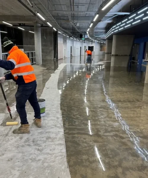 Metallic epoxy flooring finish with a flowing, three-dimensional pattern.