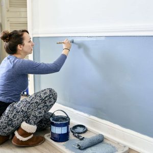 woman-painting-wall-at-home-.jpg